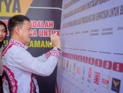 Pj Bupati Kampar Tandatangani Deklarasi Pemilu Damai Berlalu Lintas