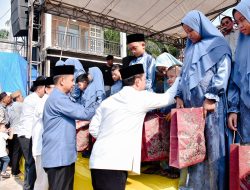 Plh Sekda Kampar Berbagi Kepada Anak Yatim Piatu Sekaligus Hadiri Halal Bihalal