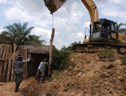 Satgas TMMD ke121 Kodim 0313/KPR Lakukan Pengupasan Badan Jalan dan Pemasangan Cerocok Box Culvert