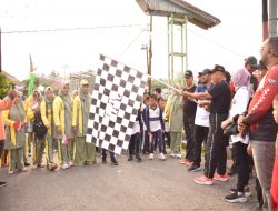 Meriahkan HUT RI K-79, Pemerintah Kecamatan Kuok Gelar Jalan Santai